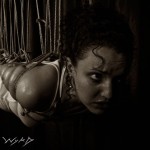 Molly Dolly sweating in multi point shibari suspension bondage
